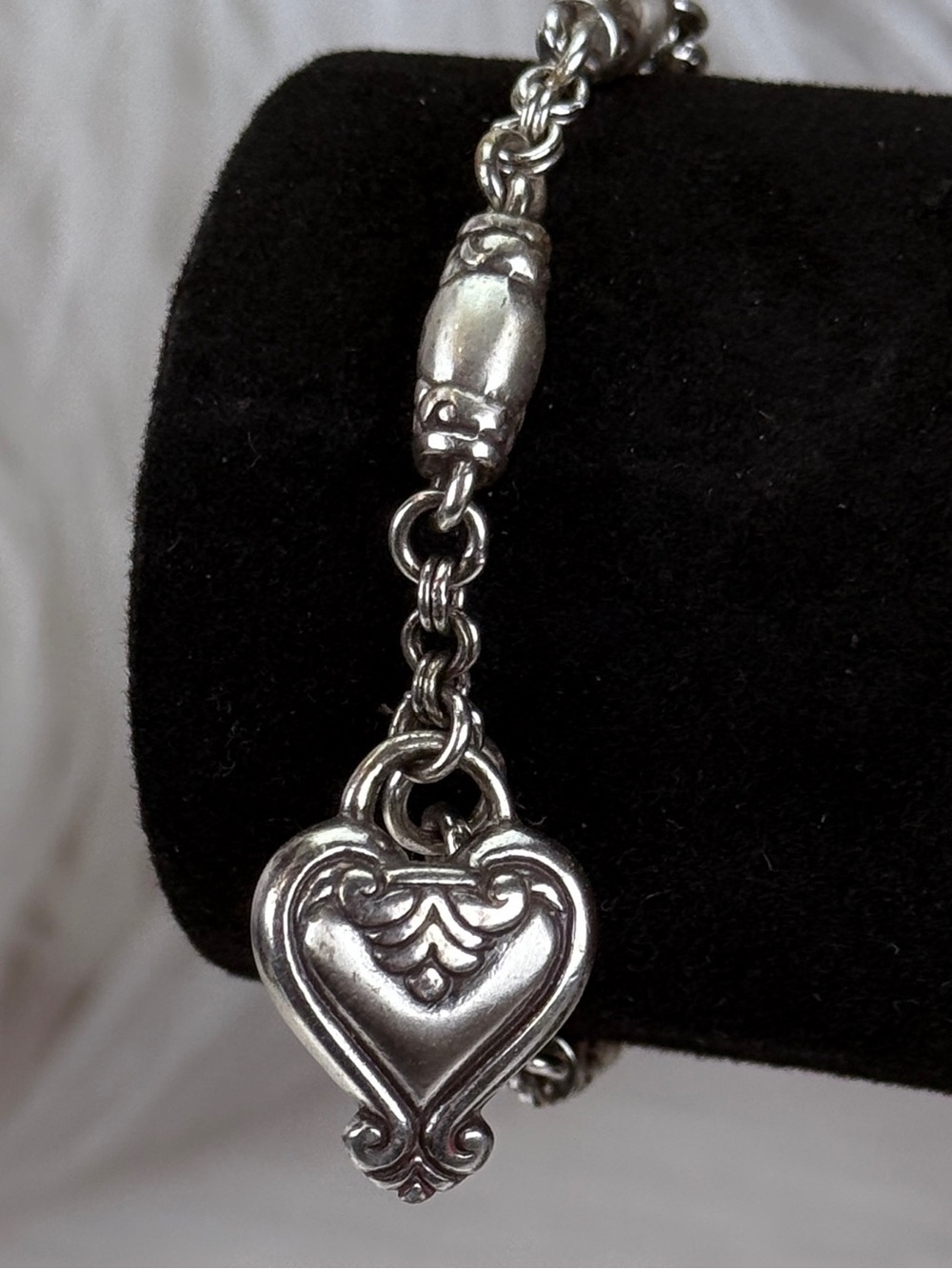Beautiful weighted Silvertone heart charm bracelet